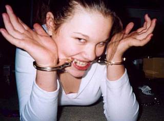 she chews her handcuff chain