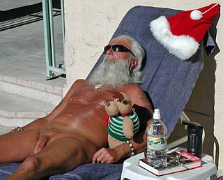 Santa Clause kicking  back for some nude sunbathing