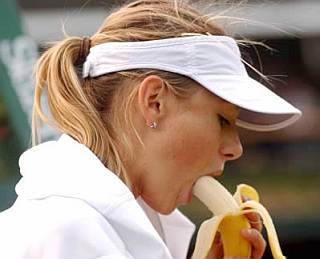 woman eating banana