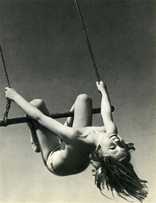 topless girl on swing