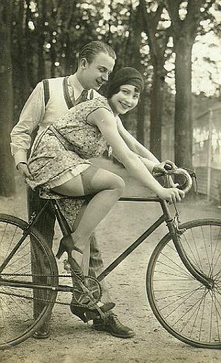 pretty girl getting fondled on a bicycle