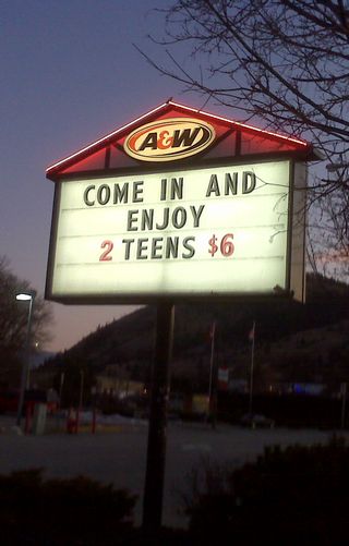 A&W drive in sign advertising teens