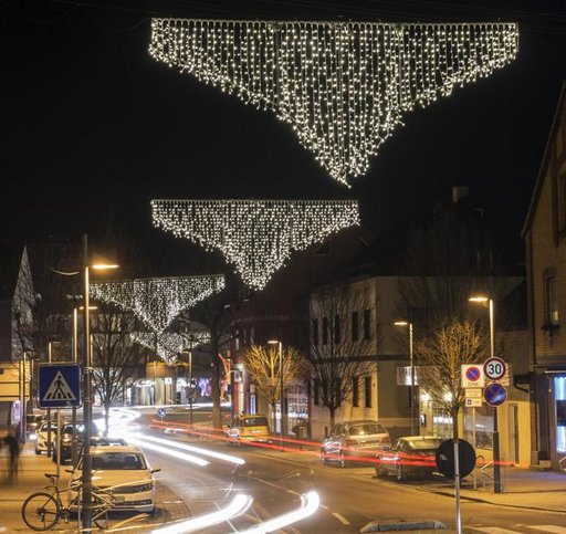 erotic holiday lights festooned in the shape of giant panties over a European city at Christmas