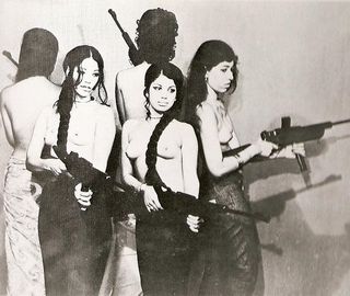 five nude girls with guns