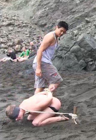 dragged into position for the beach bondage sex
