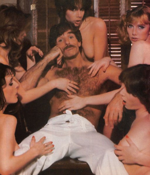 Harry Reems lounges with five beautiful porn stars