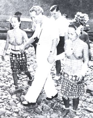 Malcom MacDonald among the Dayak women