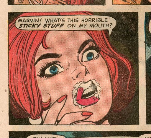 comic book heroine with what looks like cum or semen or jizz on her lips and face after a facial
