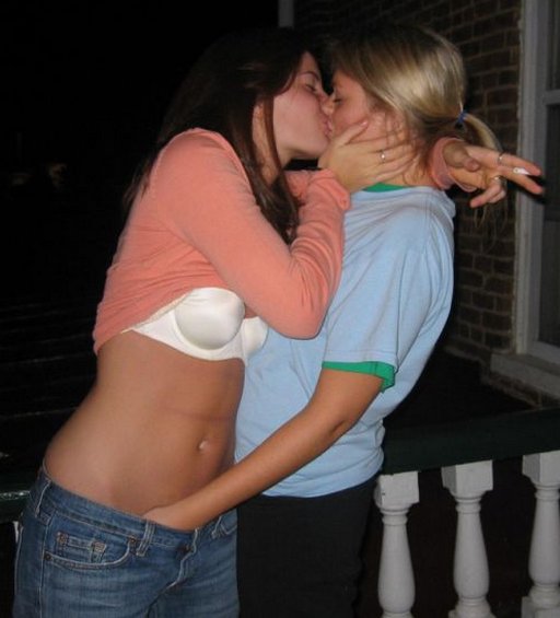 two girls in a passionate kiss