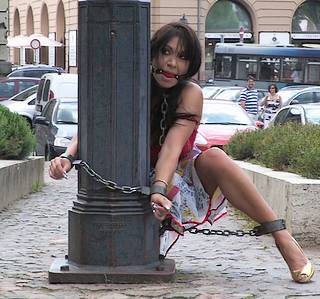 chained to a light pole in public bondage