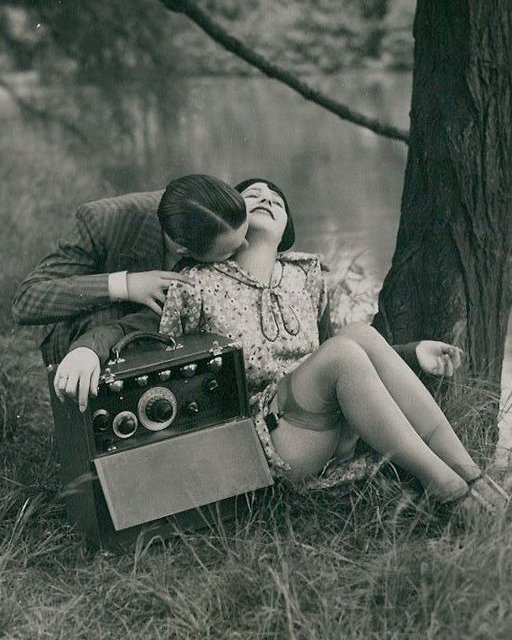 kissing her neck during a radio seduction in the park