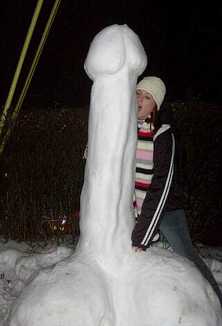 licking a big snow phallus