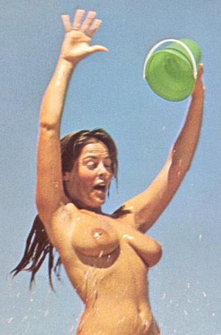 nudist girls splashing herself with a bucket