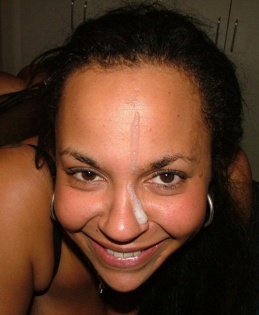 a spurt of jizz on the forehead and face of this smug blowjob queen
