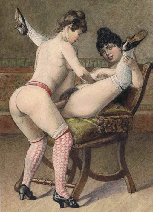 vintage lesbians take turns with a strap-on dildo
