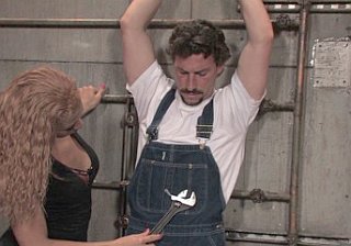 eddy the plumber in handcuffs and overalls