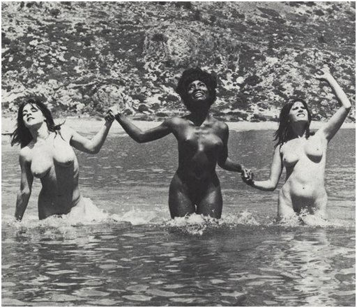 three women nude and splashing in Greece on the island of Rhodes