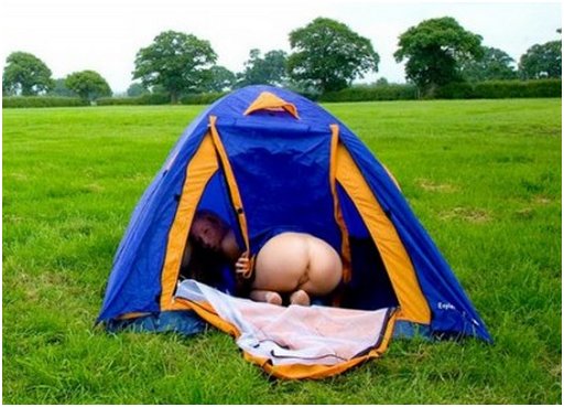 ruth shows her ass as she crawls naked into her tent