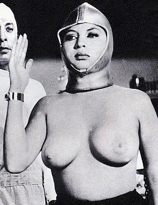 unhappy topless woman in monster movie
