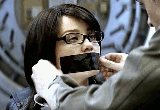Erika Christensen gagged with black tape