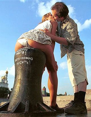 kissing on a bollard