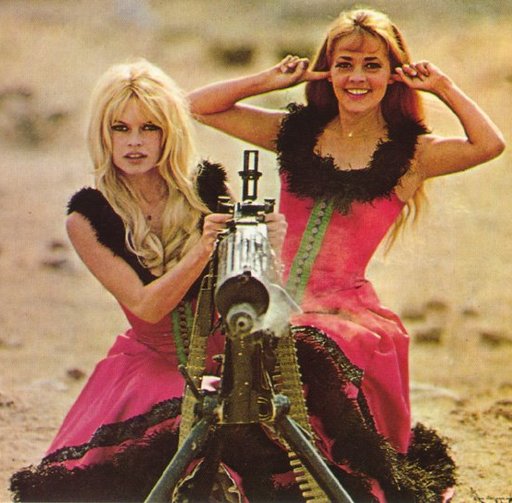 Brigitte Bardot firing a water-cooled machine gun