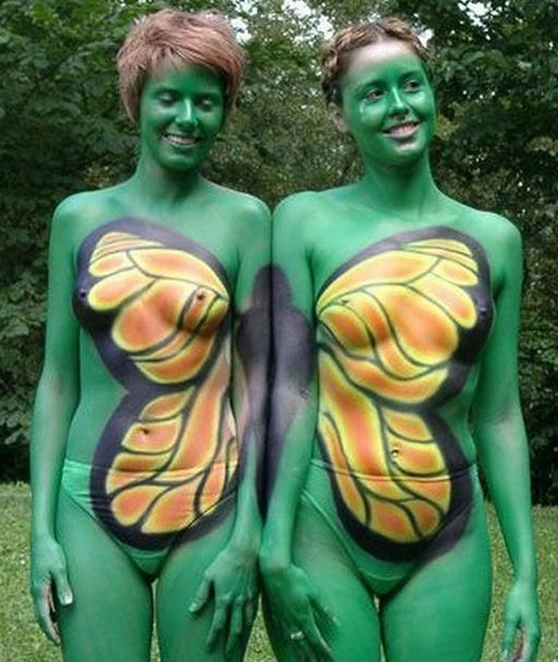 nude mother-daughter pair painted like a butterfly