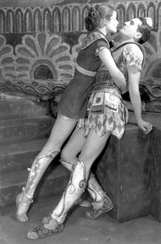 Katharine Hepburn just about raping a handsome fellow