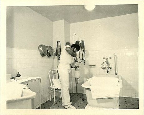 enema technician prepares the enema solution