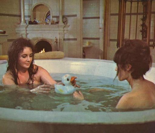 Elizabeth Taylor and Mia Farrow in a jacuzzi