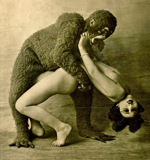 person in a scary plush animal suit attacking a woman