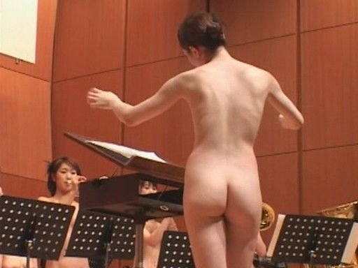 Naked conductor conducts nude musical orchestral performance