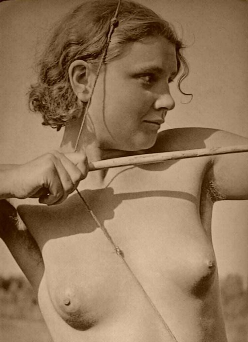 art nude of Dianna the hunter doing a bit of naked archery