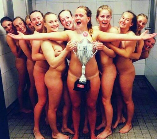 naked victorious handball team in the shower grinning