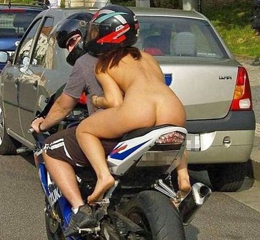 naked except for her helmet