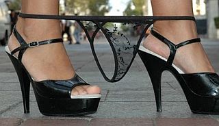 her tiny undies are around her ankles in the street