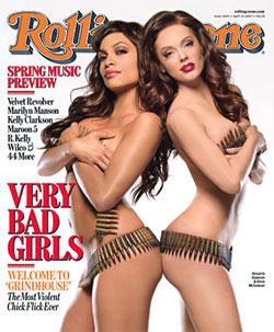 rosario dawson and rose mcgowan wearing nothing but ammo belts