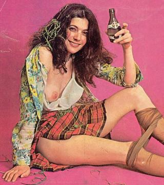Perrier ad showing disheveled woman after a roll in the hay