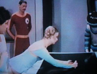shrunken woman being picked up