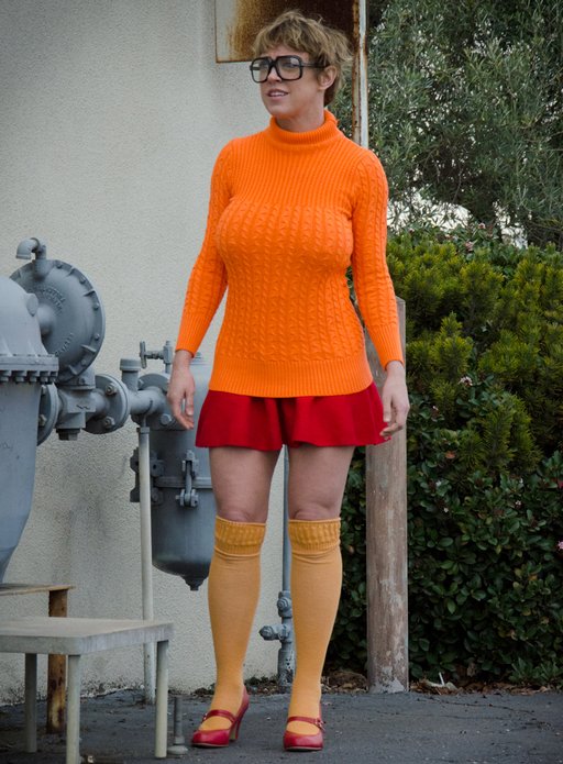 velma getting ready to snoop into an abandoned warehouse