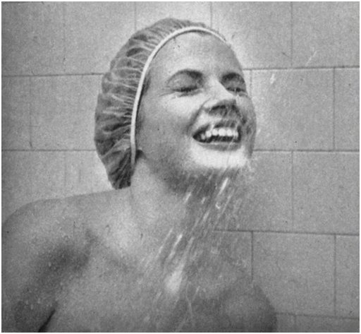 anita eckberg nude in the shower with a shower cap on to protect her hair