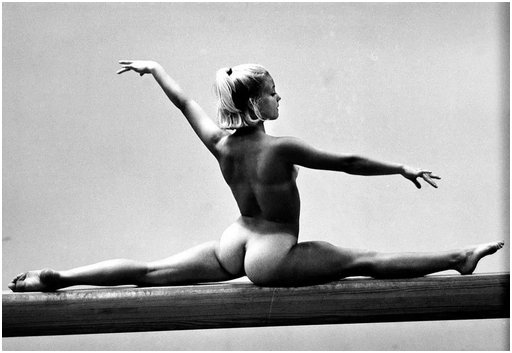 Olympic athlete and gymnast Cathy Rigby naked on a balance beam in Sports Illustrated