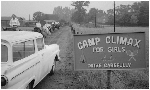 screenshot from Kubrick adaptation of Lolita showing Camp Climax for Girls sign