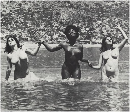 three women nude and splashing in Greece on the island of Rhodes