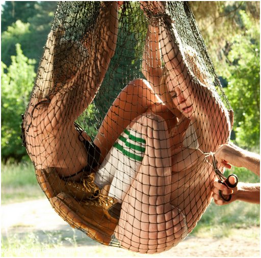 two pretty blondes captured in a net trap