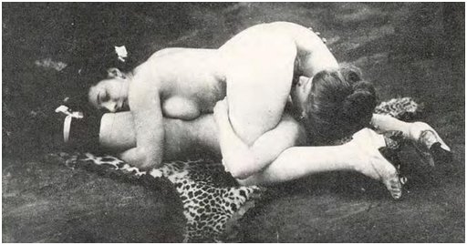 two lesbians licking pussy on a cougar skin rug in sixty-nine pose