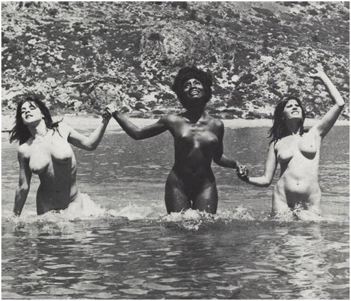 three nude models from California wading in the Aegean sea on the island of Rhodes