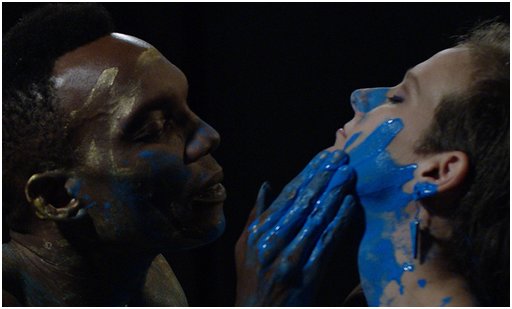 messy intimate body painting scene